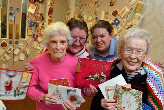 Westoe Grange Care Home Christmas cards. Residents Elsie Burne and Edythe Brandon with staff from left deputy manager Liz Capewell and care assistant Emma Barker