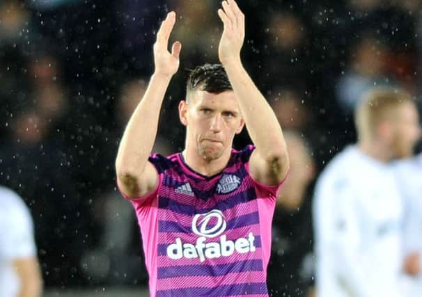 Billy Jones is back in training ahead of Monday's visit to Manchester United