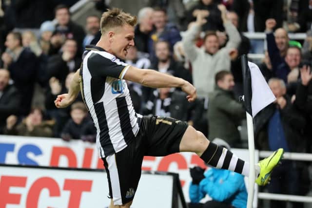 Dwight Gayle and Matt Ritchie celebrate