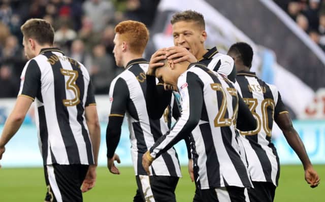 Dwight Gayle celebrates after putting Newcastle back ahead against Nottingham Forest