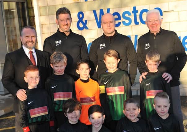 Harton and Westoe Miners under 8's sporting their new kit sponsored by Peter Johnson Funerals.