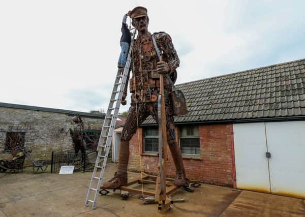 A giant metal soldier towering just under six metres, made from scrap metal by blacksmith Martin Galbavy, for a private client to commemorate the First World War. Picture PA Wire
