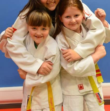 South Shields Judo Club Kendal competition winners. From left Imogen Roeves, 9 , Meghan Roeves, 14 and Charlotte Hallway, 9.