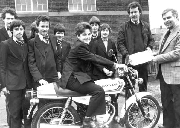 A motorcycle is presented to Harton Comprehensive School.