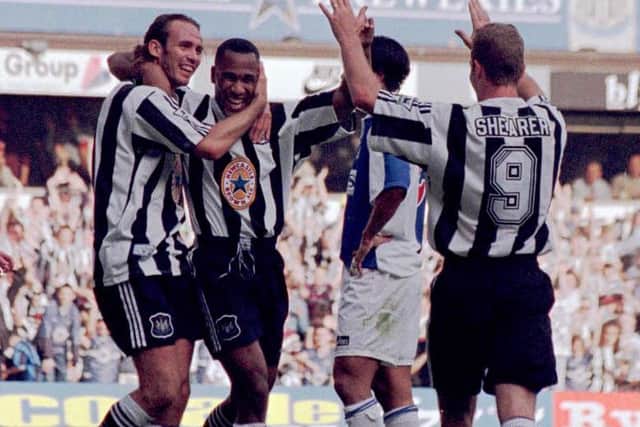 Les Ferdinand (second left) scores for Newcastle in 1996.
