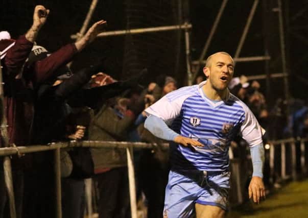 Gavin Cogdon celebrates his second goal in the win at Morpeth Town on Wednesday. Image by Peter Talbot.