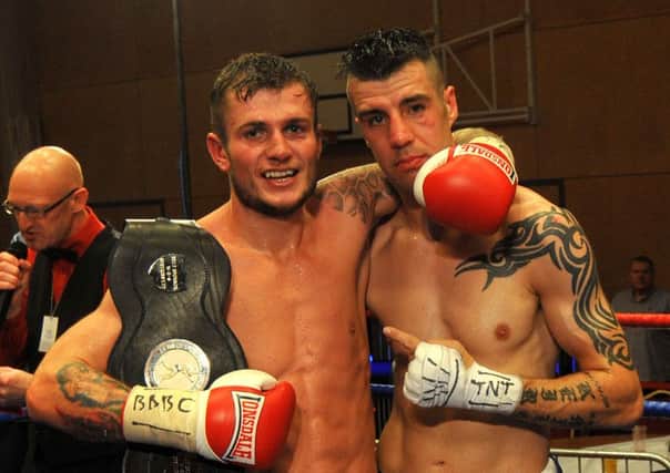 Tom Whitfield (right) with Daniel Cope after their Northern Area title fight. Picture by TOM COLLINS