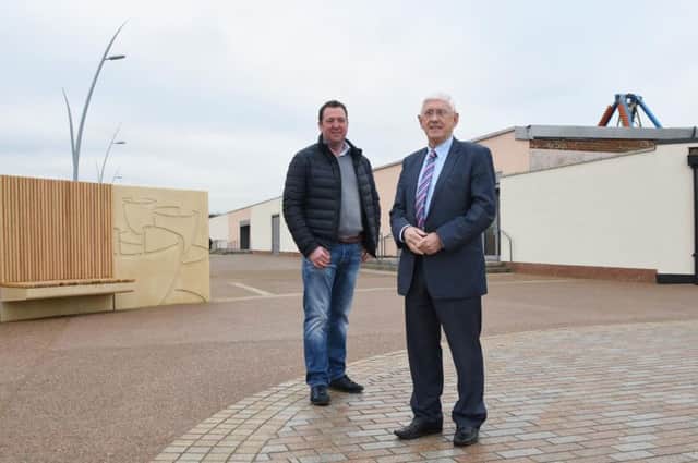 The seafront project has been completed. (L-R) Michael Sheeran with coun John Anglin.
