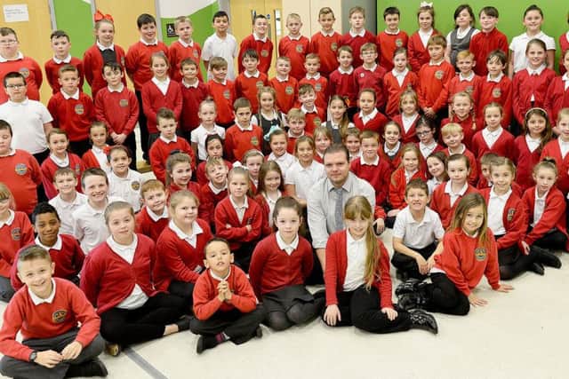 Harton Primary School pupils with music teacher Andrew Richardson Picture by FRANK REID