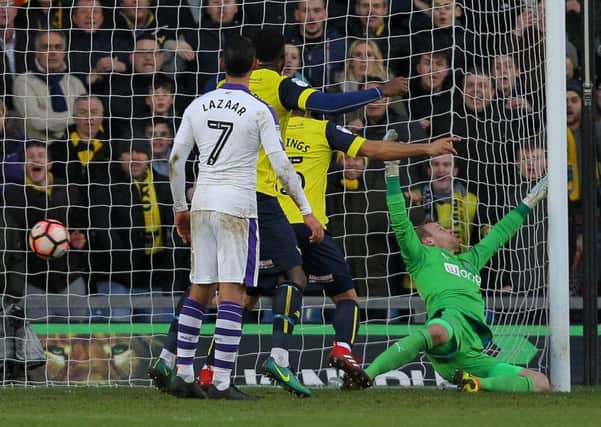 Newcastle United goalkeeper Matz Sels, right, is beaten by Curtis Nelsons header to put Oxford 2-0 up.