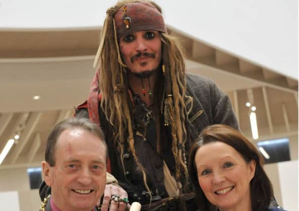 The Mayor Cllr Alan Smith and Port of Tyne's Susan Wear with Captian Jack Sparrow at launch the new exhibition Shiver me Timbers.