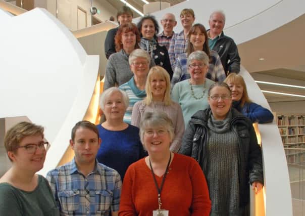 Library Voices with choir leader Amy Leach, front left, and organiser Maureen Cairns, front right.
