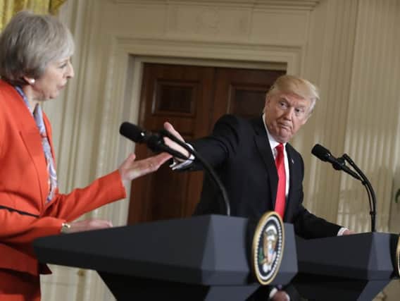 PA picture of Donald Trump and Theresa May at the press conference following their meeting last week.