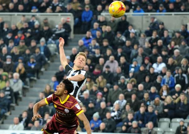 Matt Ritchie gets up to head Newcastle 2-1 up against QPR. Picture by Frank Reid