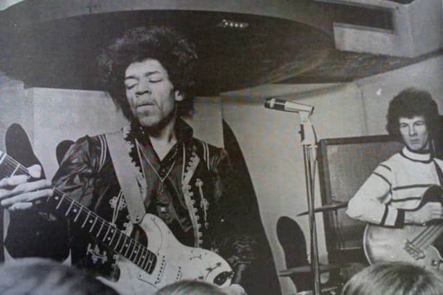 Jimi Hendrix performs at The New Cellar in one of the few existing photos from the gig