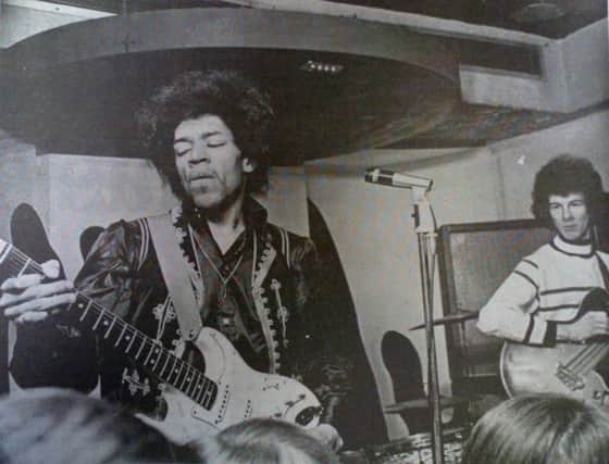Jimi Hendrix performs at The New Cellar in one of the few existing photos from the gig