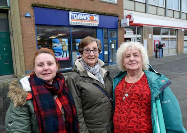 From left, Stacey Thompson, Linda Lindsey and Joan Pattison outside of the former Dawson and Sanderson travel agents building in Fowler Street, South Shields. Picture by FRANK REID