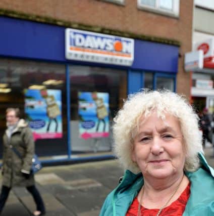 Joan Pattison outside of the former Dawson and Sanderson travel agents building in Fowler Street, South Shields. Picture by FRANK REID