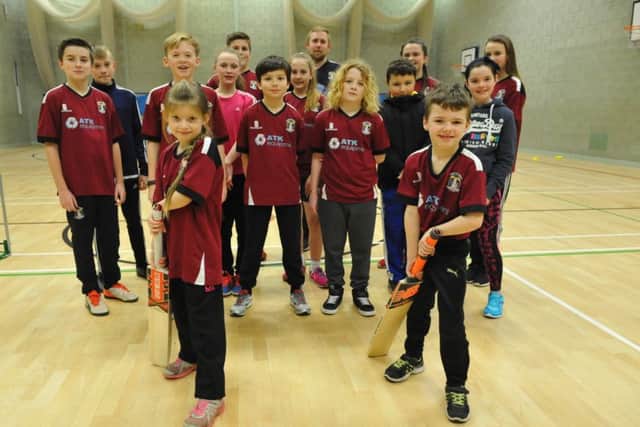 Young cricketers from Marsden Cricket Club practice at Harton Technology College.