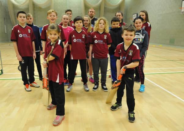 Young cricketers from Marsden Cricket Club practice at Harton Technology College.