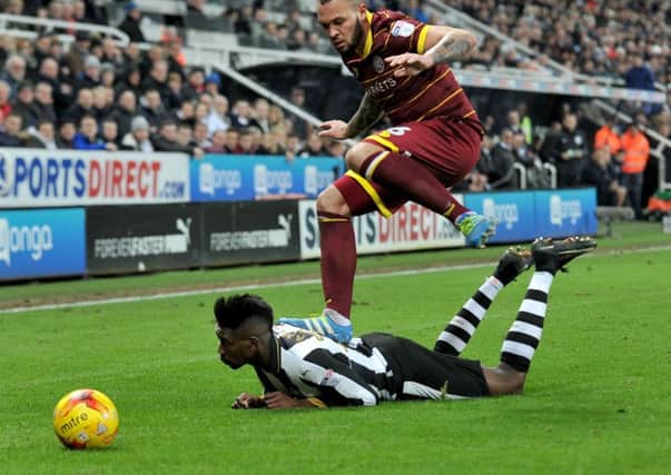 Painful: Sammy Ameobi gets stood on by QPR's Joel Lynch in midweek. Picture by Frank Reid