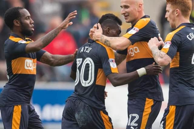 Christian Atsu celebrates scoring against Rotherham United.