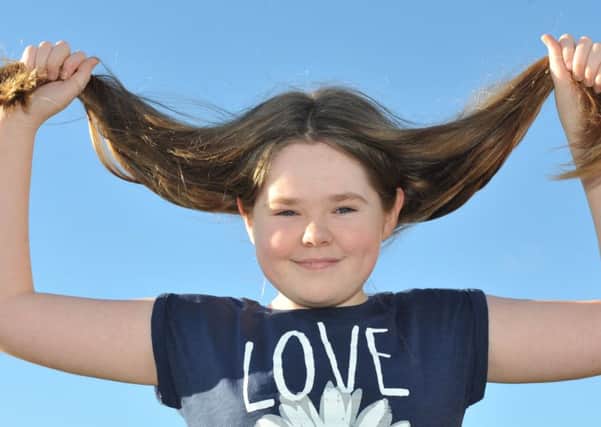 Katie Harte has her hair cut off to raise money for the Little Princess Trust.