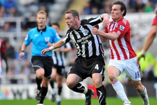 Kevin Nolan during his time at NUFC, battling with SAFC midfielder Dean Whitehead.