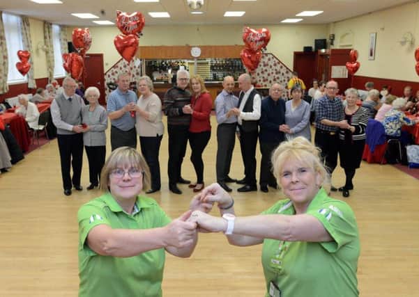 Asda community colleagues Tracey Tough, from the Boldon store, and Mavis Maughan, from the South Shields store, with couples at the Boldon and Blyth Valentine's tea dance at the Charles Young Centre in South Shields. Picture by North News & Pictures