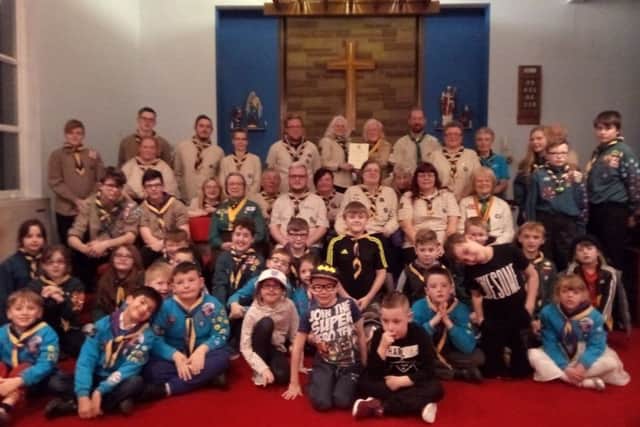 Tommy Cleveland with his scout group