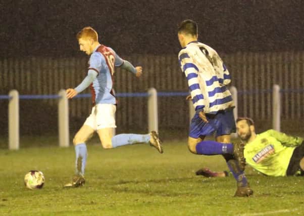 Michael Richardson rounds the Benfield keeper to hit Shields winner at Newcastle Benfield last night. Picture by Peter Talbot