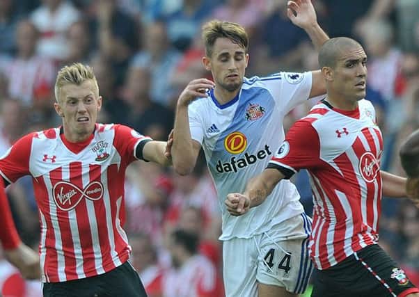 Southampton's James Ward-Prowse (left) and Oriol Romeu make life tough for Sunderland's Adnan Januzaj in August's 1-1 draw at St Mary's. Picture by Frank Reid