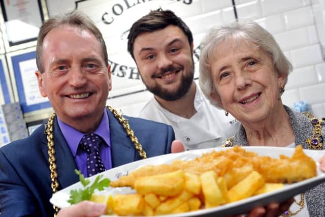 The Mayor Coun Alan Smith and Mayoress Coun Moira Smith are served fish and chips by Colman's Richard Ord Jnr. Picture by Tim Richardson