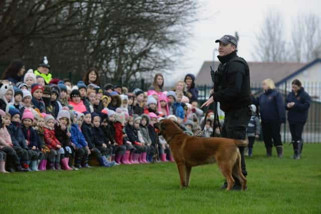Children were also treated to a display by the forces police dogs as they showed off their skills.