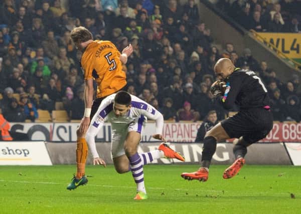 Newcastle Uniteds Aleksandar Mitrovic collides with Wolverhampton Wanderers goalkeeper Carl Ikeme at Molineux on Saturday evening
