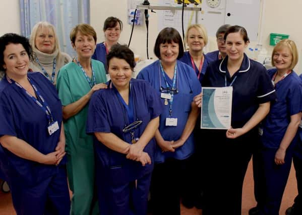 The endoscopy team at South Tyneside District Hospital with their accreditation.