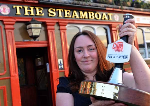 Kathleen Brain, of the Steamboat, celebrates winning Camra's Sunderland and South Tyneside Pub of the Year.