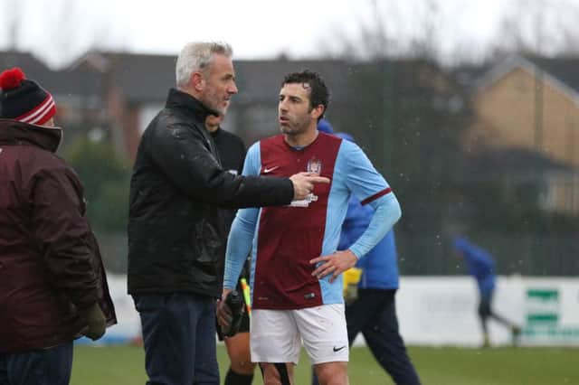 Joint manager Lee Picton passes on some instructions to South Shields midfielder Julio Arca. Image by Peter Talbot.