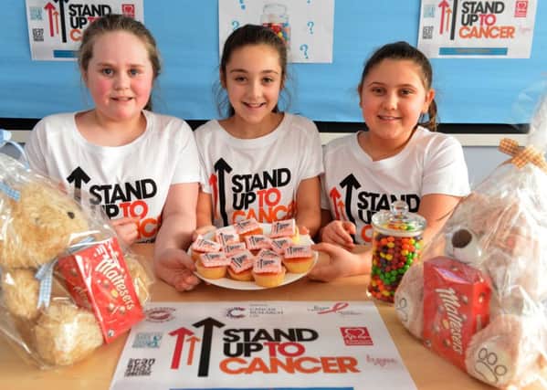 St Joseph's Primary School pupils cancer fundraisers, from left Grace Parker, Lauren Gibson and Leila Kassae
