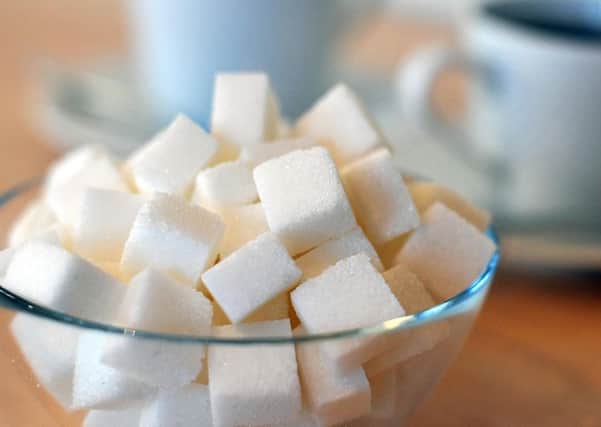 Sugar in food and soft drinks can cause obesity and diabetes.