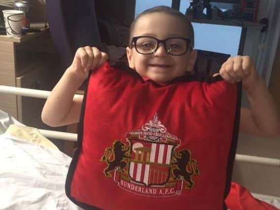 A photo taken of Bradley Lowery in hospital this week as he models his new glasses.