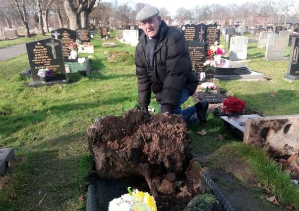 Tommy Oughton at the graveside of his wife Mary