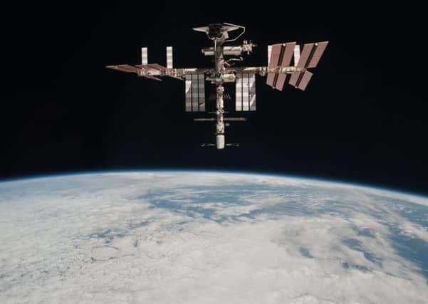 The International Space Station above Earth. Pic: NASA.