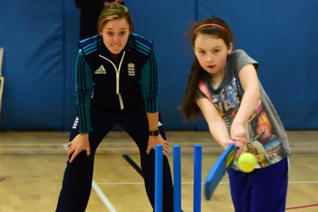 England Women cricketer Danielle Hazell keeping wicket during her coaching session for girls at Harton Technolgy College, South Shields on Sunday.