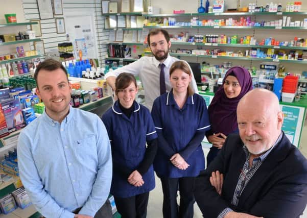 Flagg Court Pharmacy has been nominated for a Best of Health Award
. From left, phamacists James Tully and Tony Schofield.
Back from left, Nadia Leal, Lisa Kujundzic, Luna Ahmed and Jordan Williamson.