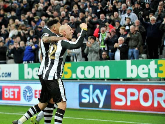Jamaal Lascelles & Jonjo Shelvey celebrate after Newcastle's second goal against Aston Villa on Monday.
