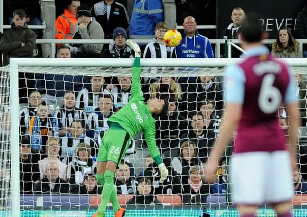Karl Darlow makes a save for Newcastle