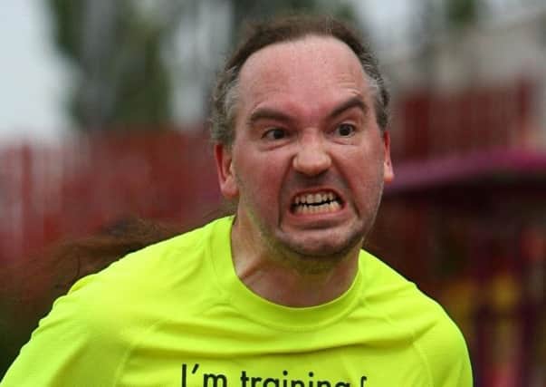 Paul Jukes' "run face" has won him a place in this year's London Marathon