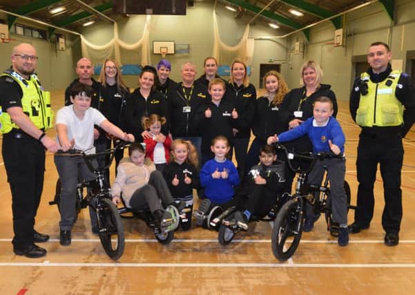 Police funding supply new bikes to the Kayaks charity