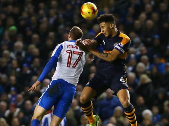 Glenn Murray and Jamaal Lascelles